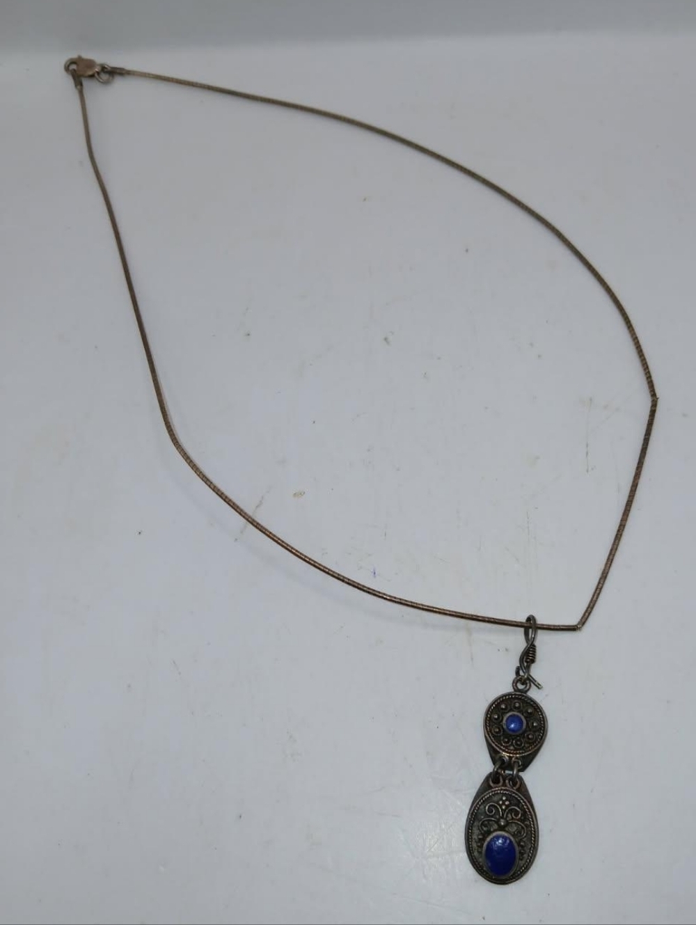 Lapis necklace 
A couple kinks in the chain sterling silver